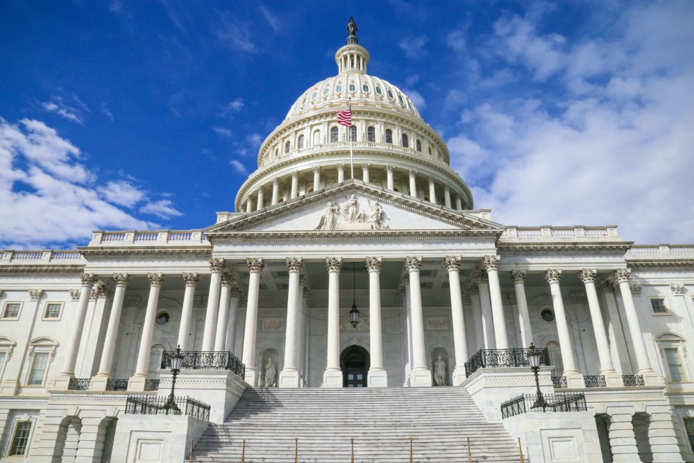 Front view of capital building on sunny day