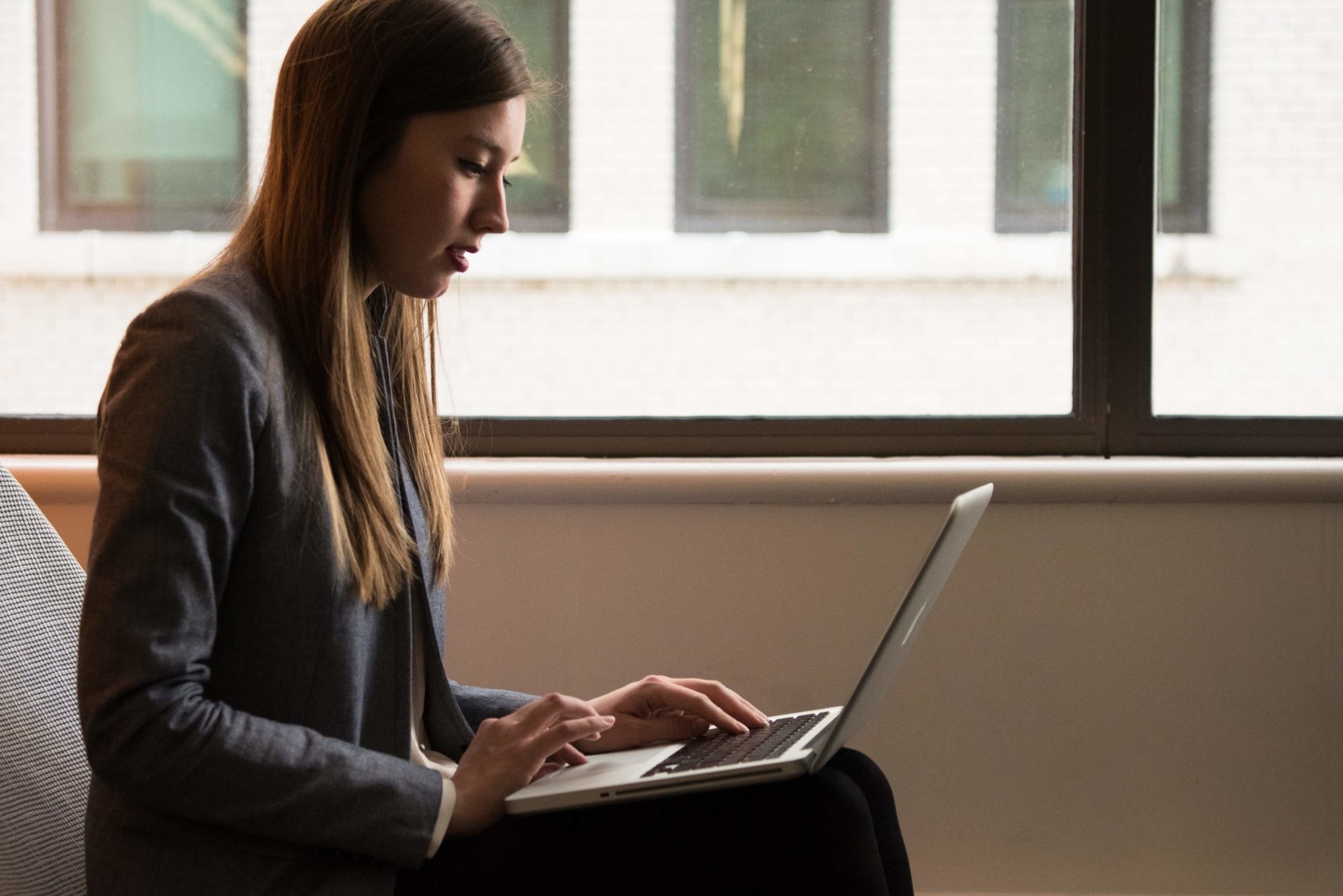 Woman focused working on her computer