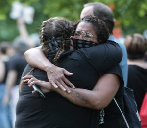 Two women hugging